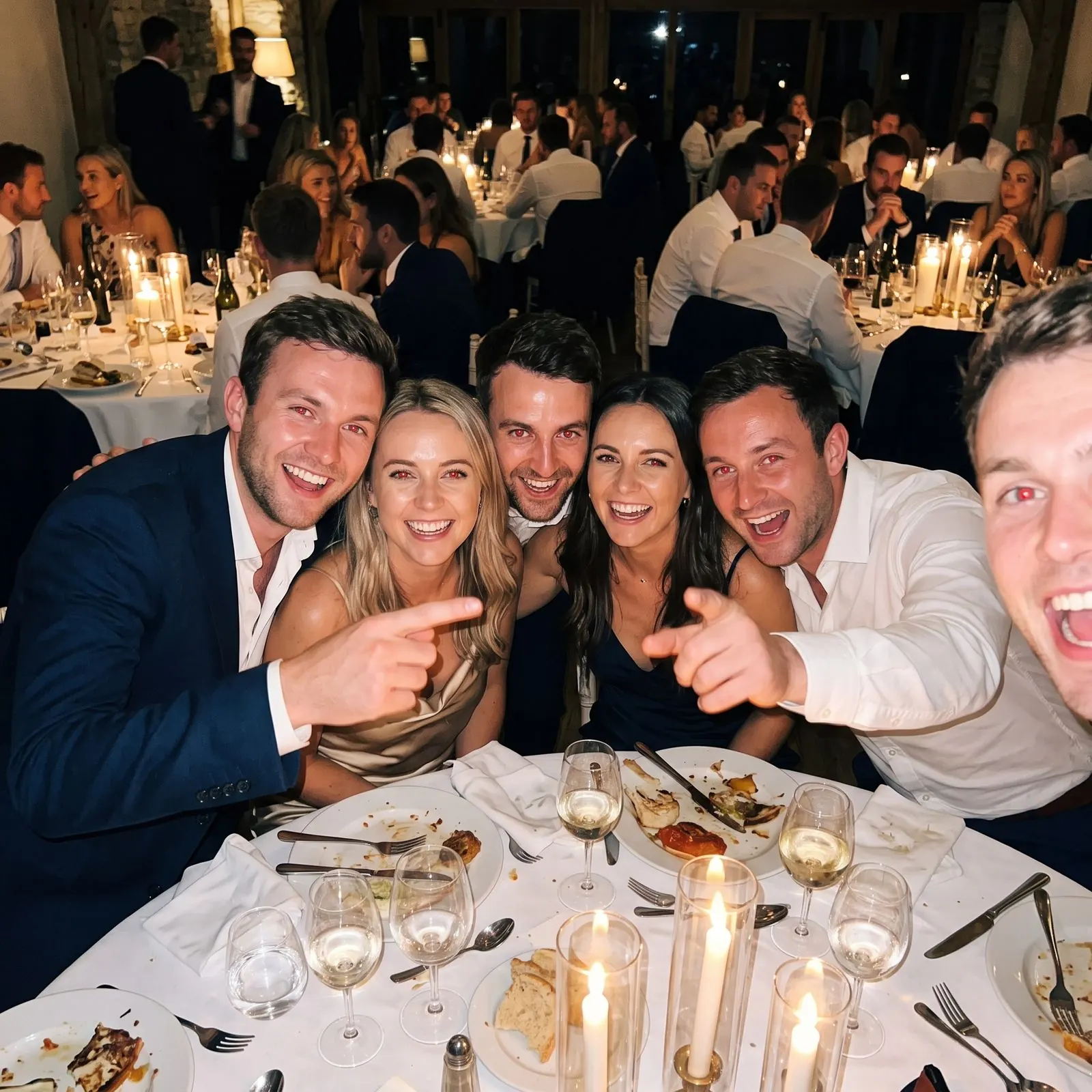 Live photo slideshow for events showing a guest’s group selfie from a wedding dinner table
